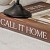 The same spot at 400%: the printed title still legible and the candlestick base holding its edge